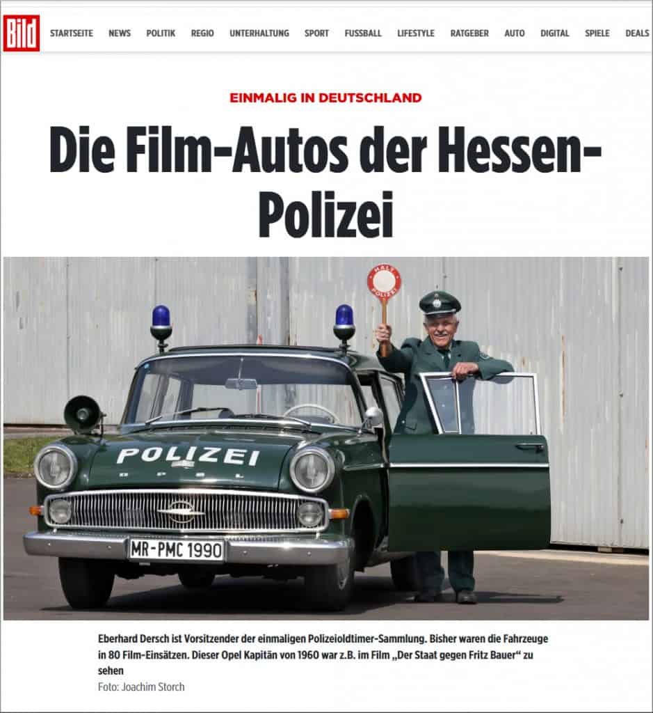 Ein Screenshot des Titelbildes im Onlineportal der BILD-Frankfurt vom 14.10.2022 - es zeigt den Opel Kapitän aus dem Polizeioldtimer Museum Marburg mit dem Vorsitzenden Eberhard Dersch