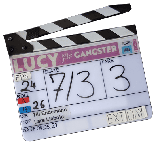 Die Klappe zum Film "Lucy ist jetzt Gangster"