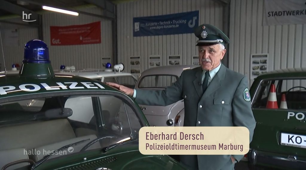 Screen aus "hallo hessen" mit Eberhard Dersch und dem Polizei-Käfer